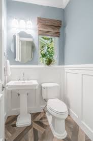 Wainscoting is installing wooden trim and panels in a pattern along the lower wall. 75 Beautiful Wainscoting Powder Room Pictures Ideas July 2021 Houzz