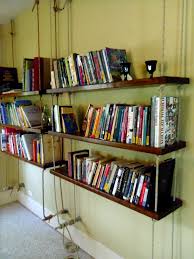 An ideal diy bookshelf in the living room, with a lot of decor pieces, paintings, family gallery wall, or anything else. 25 Awesome Diy Ideas For Bookshelves