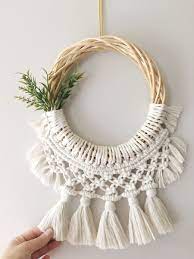 Since most hang macrame wall hangings are vertical, they are typically best for narrow spaces that need a bit of brightening up, but you can also. Macrame Door Wreath Macrame Macrame Design Macrame Patterns