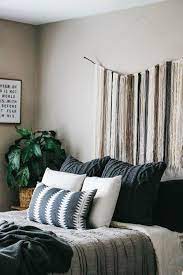 Start with different shades of brown, tan, warm gray, and green. An Earthy Boho Bedroom Makeover The Anastasia Co