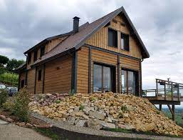 Maison ossature bois finie, crépi blanc sur isolation et terrasse ipé. Grande Maison Bois Style Chalet Nos Maisons Ossatures Bois 68 Haut Rhin