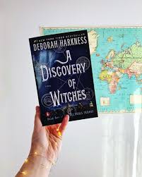 A Discovery Of Witches By Debroah Harkness Book Review Mylibrarycardworeout Books A Discovery Of Witches Witch Books