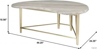Please confirm item location ny or nj with dealer. Accentrics Home Kidney Shaped Marble Top Cocktail Table From Pulaski Coleman Furniture