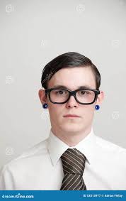 Young Man with Pierced Ears Wearing Shirt and Tie Stock Image