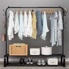 With vetements, fingers of sarcastic blame are liberally jabbed at corporate managers and bankers i love uniforms. Porte Vetements Avec Tige Superieure Penderie Avec Etagere De Rangement Chaussures 6 Crochets Noir 110 33 150 Cm Vinteky Cdiscount Maison