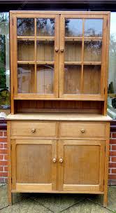 a glazed oak kitchen dresser by heal