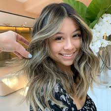 A black short bob with red peekaboo highlights for a passionate and bright look a black wavy angled bob with hot pink peekaboo highlights looks super contrasting Best Diy Hair Highlights Ideas For At Home Makeovers Balayage Striking Money Pieces And More Buro 24 7 Singapore