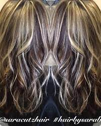 Dark brown hair with blonde highlights and lowlights. Dramatic Blonde And Brown Hair Highlights Lowlights Curls Texture Soft Blonde Brun Brown Hair With Blonde Highlights Hair Highlights Brown Hair With Highlights