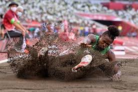 Men's long jump awards ceremony at the 2020 olympics in tokyo, japan bronze medalist maykel masso of cuba stands on the podium at the awards ceremony for the men's long jump at olympic stadium. Ifigteeoxdmszm