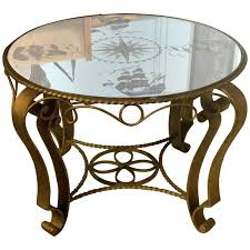 The tabletop is made from solid pine wood and has a butcher block style with visible wood grain and knots for a rustic, antique look. French Nautical Eglomise Mirror Topped Coffee Table Circa 1940 At 1stdibs