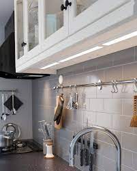 White backsplash with gray kitchen cabinets. Stromlinje Led Worktop Lighting White 60 Cm Ikea