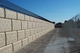 A block wall with a plaster face can be easily repaired or replastered should there be any discoloration or water seepage from planters at the top. Large Concrete Block Retaining Walls Ibrs Inc