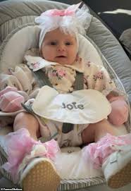 The grieving family of a baby girl who was mauled to death by a 'pocket  bully-type' dog has paid a heartbreaking tribute. Maggie-May Ann Moody was  just 13-weeks-old when she died in