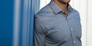 Image result for muscular men dressed fully