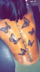 Butterfly chest tattoo black female. Pin On Na