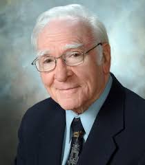 HUR BOY FROM BUCKHORN HOLLER DOES GOOD IN BIG WORLD