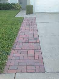 Lowe's has a wide selection of shapes, lengths, colors and materials of driveway pavers and walkway stepping stones to help you get a look that you'll enjoy. Extend Driveway A Great Way To Provide A Hard Surface Loading Unloading Landing Area When The Vehicles Occu Walkway Design Driveway Design Front Yard Walkway