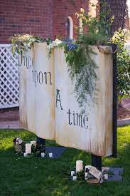 Romantic Wedding Ideas That Are Straight Out Of A Fairy Tale Storybook Wedding Book Backdrop Wedding Backdrop
