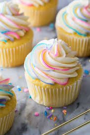 Vanilla Frosting Piped Onto A Cupcake With Colorful Swirls Vanilla Frosting Recipes Cupcake Frosting Recipes Cupcake Recipes