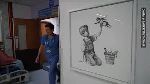Latest news and photos about the street artist banksy. Corona Bild Von Banksy Krankenpflegerin Als Superheldin Der Krise
