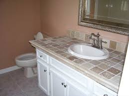 While tile may be all the rage, don't eliminate wood from your bathroom countertop ideas. Pin By Kristy Fears On Bathroom Ideas Bathroom Countertops Tiled Countertop Bathroom Bathroom Countertop Materials