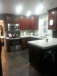 Cherry Cabinets With White Quartz Countertops Cherry Cabinets Kitchen Concrete Countertops Kitchen Cheap Kitchen Decor