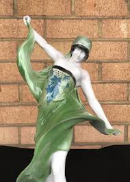 Made of pottery and finished in a shiny glaze, the pair Rosenthal Figurines Germany Rare Art Deco Porcelain Figurine Serpantine Dancer Rosenthal C 1917 3 750 00 Picclic Porcelain Figurines Art Deco Figurines