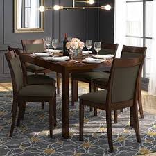Round extending tables add fashion and flexible function to your dining room. Vanalen 4 To 6 Extendable Dalla 6 Seater Glass Top Dining Table Set Urban Ladder