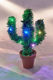 Here's expert tips on caring for a christmas cactus. Light Up Potted Cactus Christmas Tree Cactus Christmas Trees Thoughtful Hostess Gift Christmas