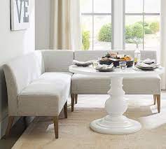 Tailored corner pleat skirts lift to reveal an open space beneath each seat, perfect for concealing a storage basket filled with table linens in the dining area or extra outer wear in the entry or mudroom. Modular Upholstered Banquette Upholstered Banquette Dining Room Bench Banquette Seating In Kitchen