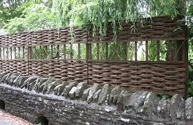 Wattle, or hurdle fencing is a traditional garden or livestock enclosure made from either willow or hazelwood. Framed Willow Hurdle Fences Winterbourne Willows
