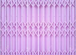 For gates installed over doorways or in walkways, maxguard gates include folding bottom track. Steel Foldable Door Background In Pink Color Stock Photo Picture And Royalty Free Image Image 93145910