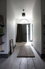 Dark Skirting Boards And Natural Wood Floors Beautiful Small Hallways Wood Doors Interior Modern Country Style