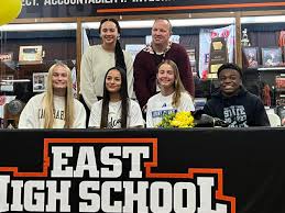 College bound: 2 of area's top runners, Harris, Kifle, sign