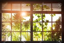 Sun Shining Through Window With Blinds In Morning Stock Photo, Picture And  Royalty Free Image. Image 154496226.
