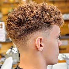 This is one of the best hairstyles for a person who has curly hair and wants to keep it crisp and clean! Curly Undercut 30 Modern Curly Haircuts For Men