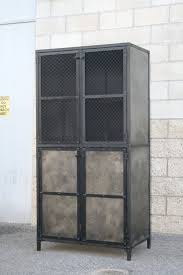 The armoire, made entirely out of mild steel and a great statement carnegie cabinet extended upward with a hutch and a small shelf. Industrial Cabinet Industrial Armoire Pantry Cupboard Etsy In 2021 Industrial Cabinet Vintage Industrial Furniture Industrial Furniture