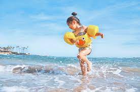 Happy kids playing on beach. Kids Playing On Beach Pictures Download Free Images On Unsplash