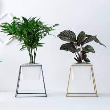 Modern outdoor planters make your garden vibrant, whether you're working with a big backyard or just a sunny balcony. Modern Large Garden Planter Flower Pot With Metal Stand Buy Planter Flower Pot Large Garden Planter Modern Planter Product On Alibaba Com