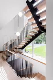 His own brand lunna design stands for interior, kitchens and stairs with high focus on design and craftsmanship to the highest standards. Modern Floating Stair With Pencil Rail East Hampton Ny Modern Staircase New York By Keuka Studios Inc Houzz