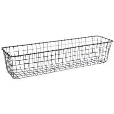 If you need a way to organize smaller items—from kids' toys and video game accessories to remotes and cords—group them into rattan or fabric baskets. Narrow Wire Basket Hobby Lobby 1736990