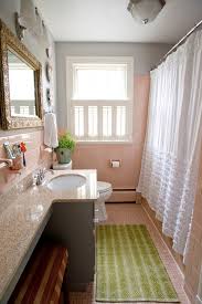 Or use a screen instead of drapes. Weekend Design 10 Easy Ways To Spruce Up Your Rental S Bathroom Times Of San Diego