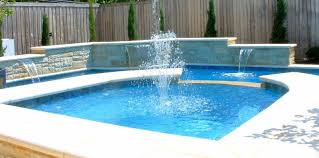 Whether you're building from the ground up or adding on to an existing pool, the inclusion of a waterfall will be a defining feature of your backyard. Pool Fountains Pros Cons Design Ideas More Pool Research