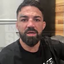 Mike Perry Threatens To Knock Jake Paul's Teeth Out, Predicts 7th Rd KO