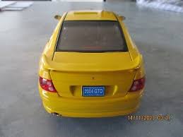 Image result for Yellow 2004 Pontiac
