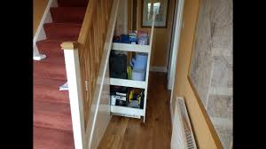 If you dread delving into the cupboard under the stairs and find yourself cowering in the face of get the hang of it make full use of wall space in understair cupboards by installing hooks and hanging. Under Stairs Pull Slide Out Cupboard Storage Diy Project Youtube