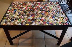 See the detailed images here. Pin By Ashley Peavy On My Diy Board Bottle Cap Crafts Bottle Cap Table Diy Bottle