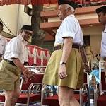 swayamsevaks with lathis, walrus moustaches
