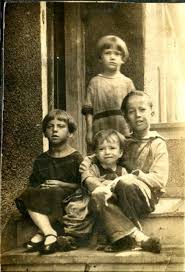 1924 My Dad at the top with his sister and brothers, Irish section of the  South Side of Chicago. This was just before the "the state took the children  away" to quote