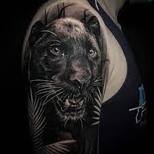 Cage tattoos mom tattoos feather tattoos body art tattoos sleeve tattoos rib tattoos for guys tattoos on side. 50 Best Panther Tattoo Designs And Meanings Saved Tattoo